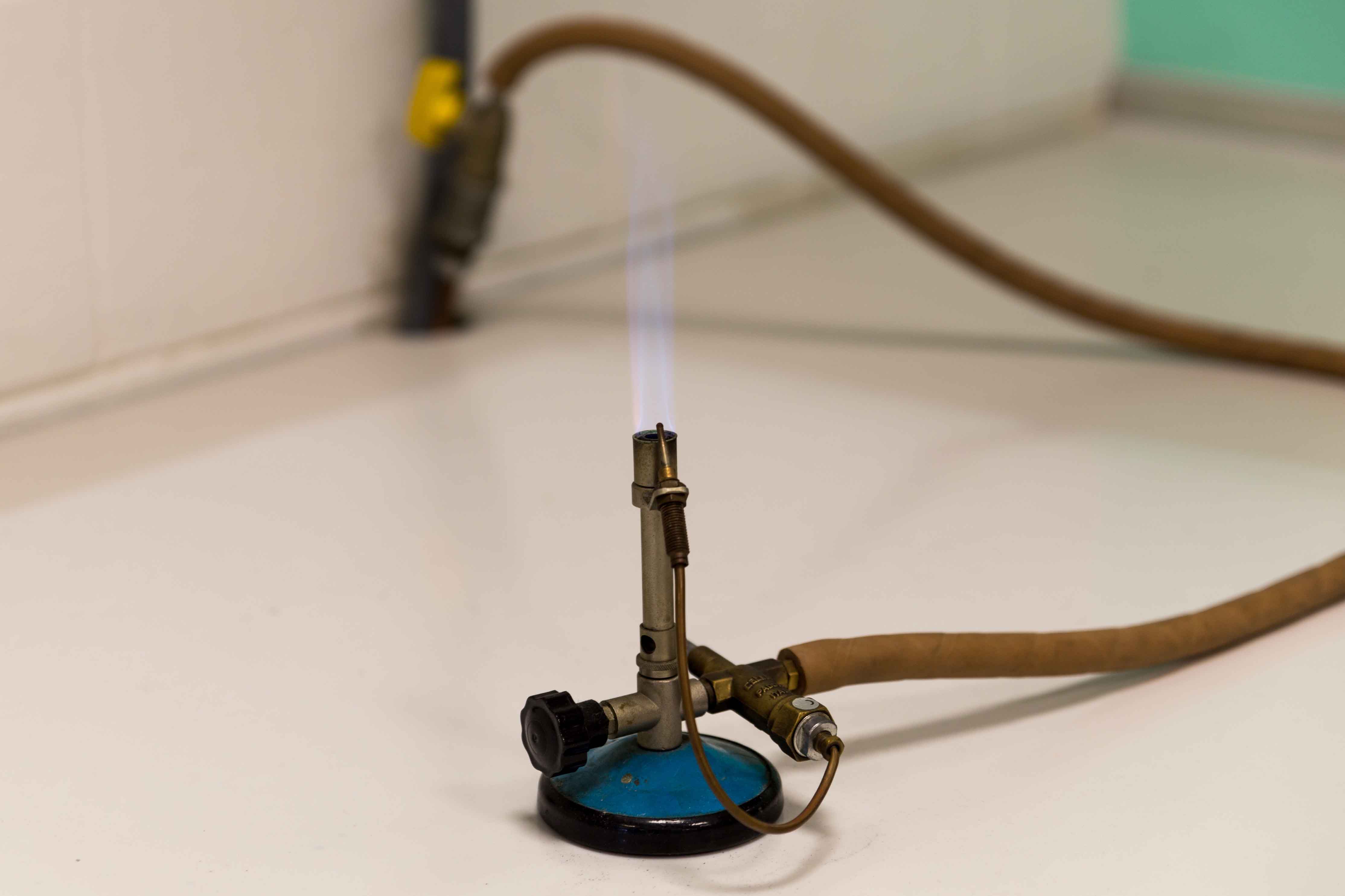 What Is Striking Back Of Bunsen Burner