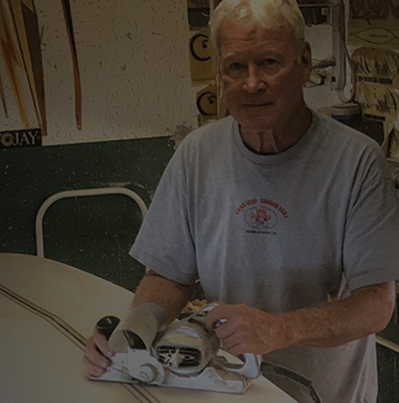 Randy Rarick with His Planer and Surfboard